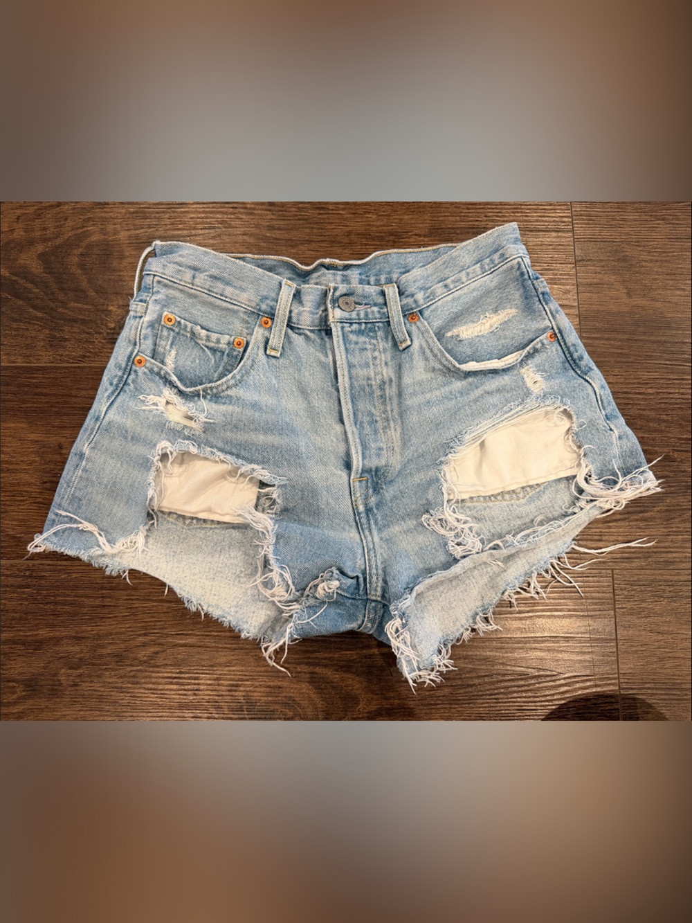 Levi’s 501 Light Wash Distressed Denim Cutoff Shorts